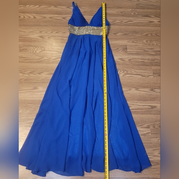 Elegant Blue Evening Gown with Gold Beading by Scala - Picture 12 of 16